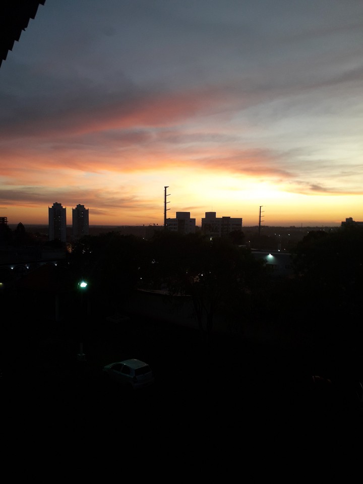 Cidade e o céu,entardecer