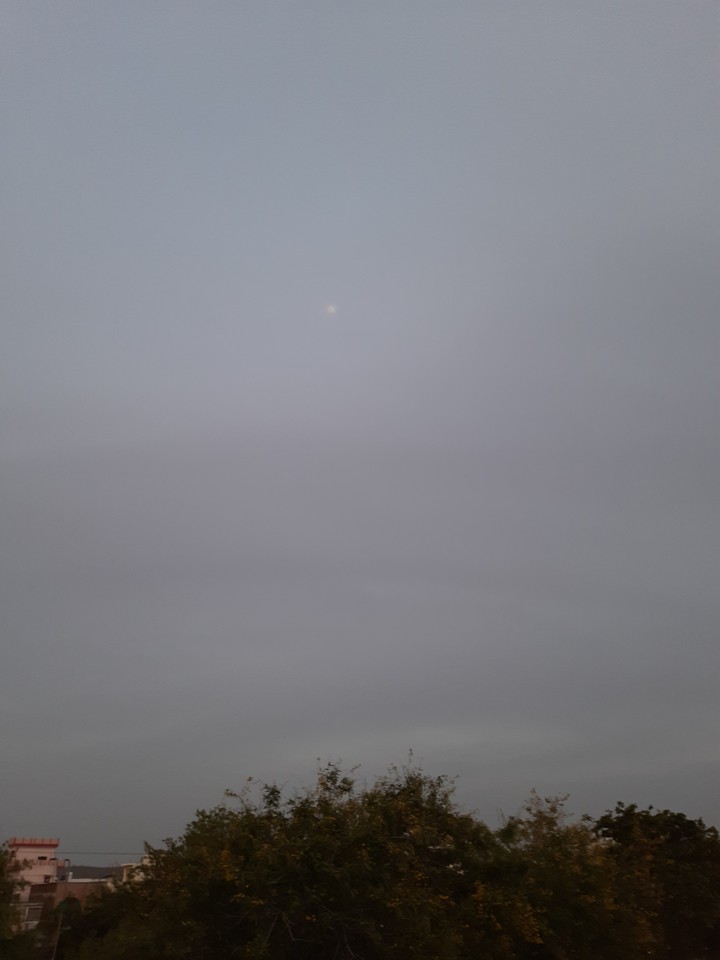 Moon in grey Sky