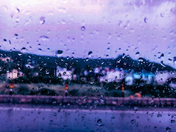 looking through the glass , the rain drops