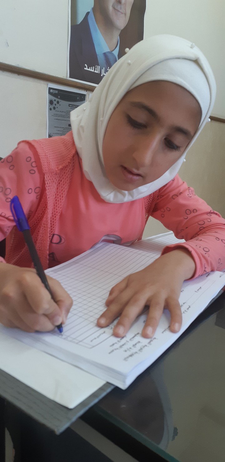 Noura.. the 12 years of age  help me at work