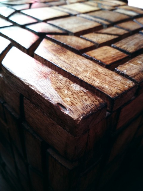 Carved out of wood.