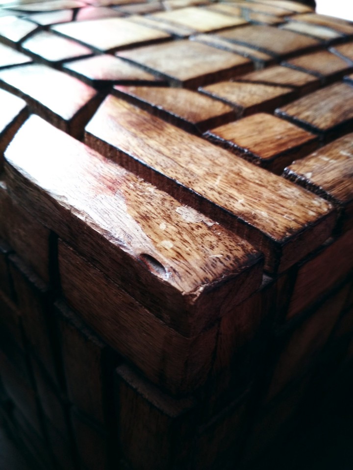 Carved out of wood.