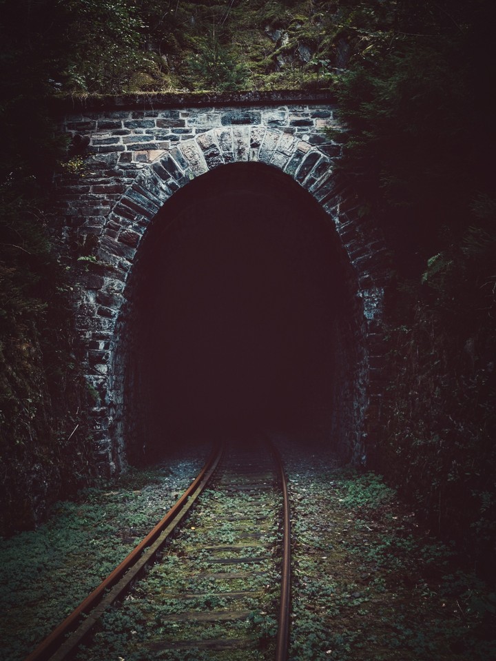 beautiful hidden railway tunnel alone and lost place.