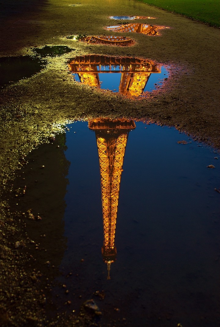 Reflection Of The Eiffel Tower