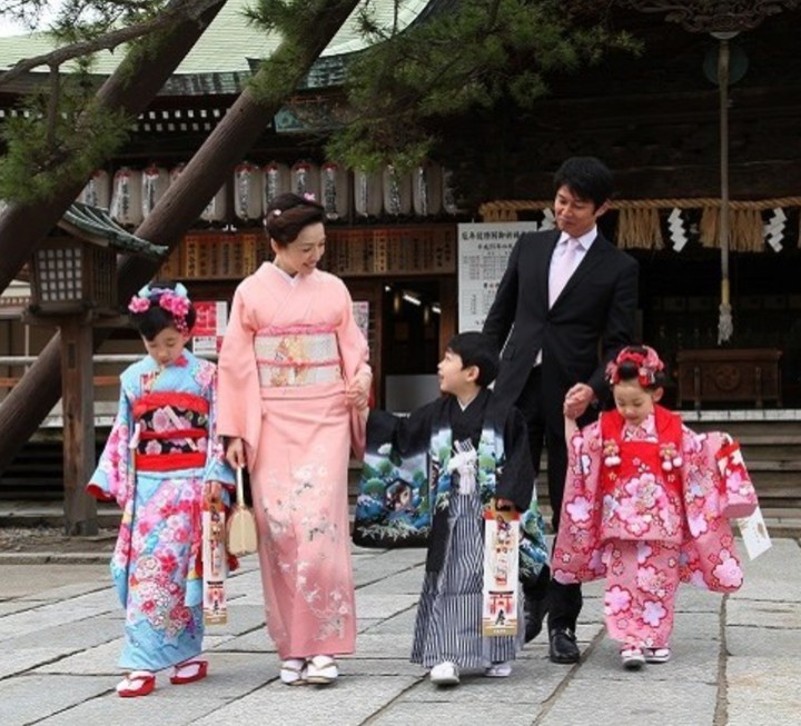 Family observing Shichi-go-san at Shinto shrine