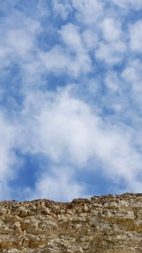 Cliff and clouds