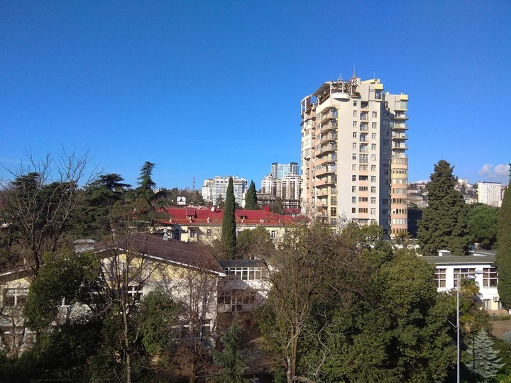 Город