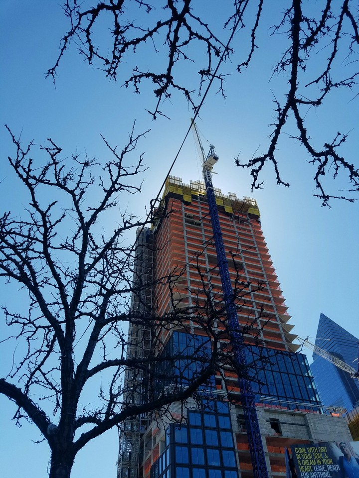 tall building blocking sun