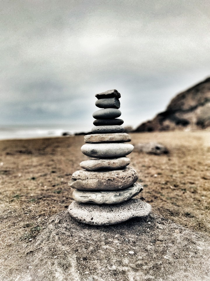 Tower of flat stones on the Gorrondatxe beach