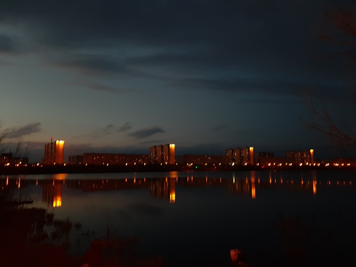 город