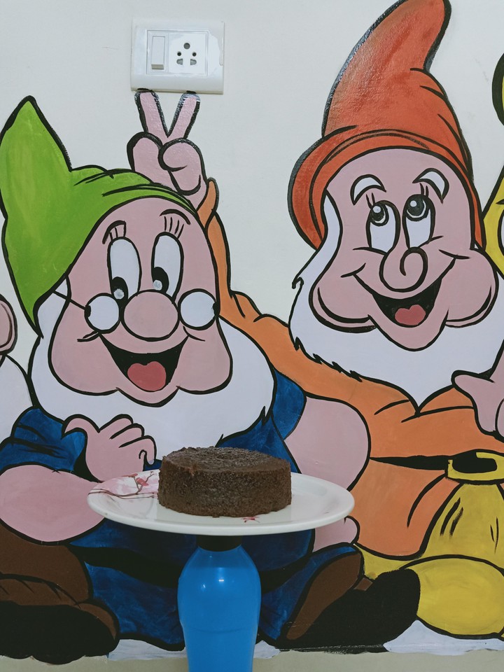 My wallpainting Of 7 Dwarf  . .and also with cake. . frnds.
