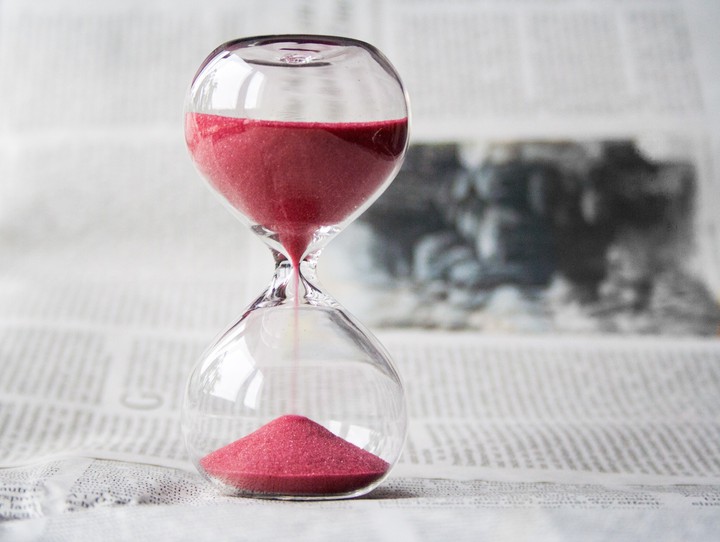 Hourglass - Sand Clock on newspaper