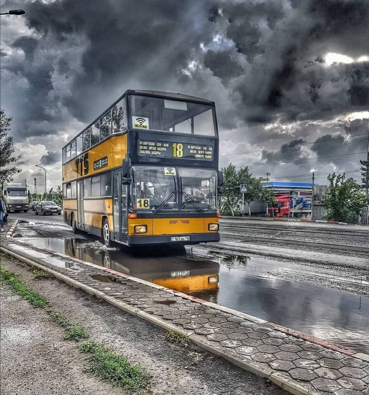 город