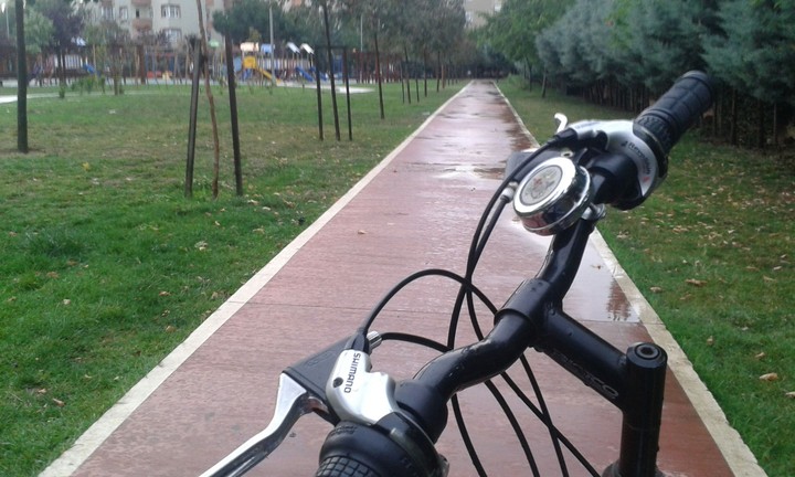 Ride a bicycle in rain