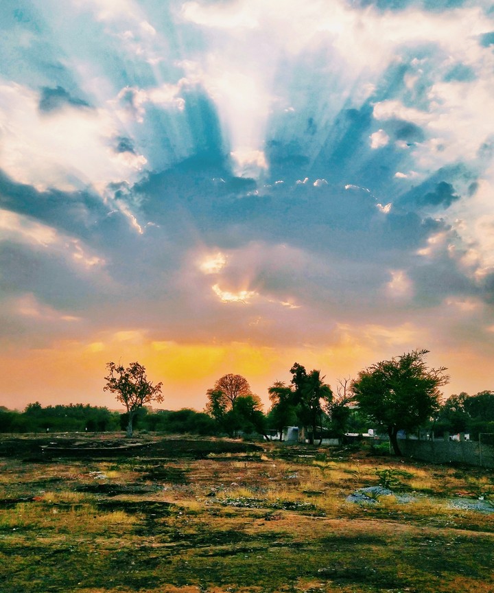 Sun behind clouds
