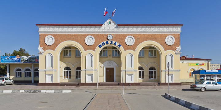 город