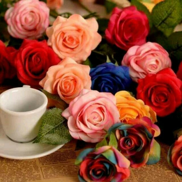 Njoy the roses and ur cup of coffee