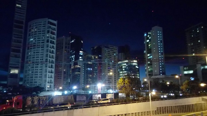 Night falls over the city.