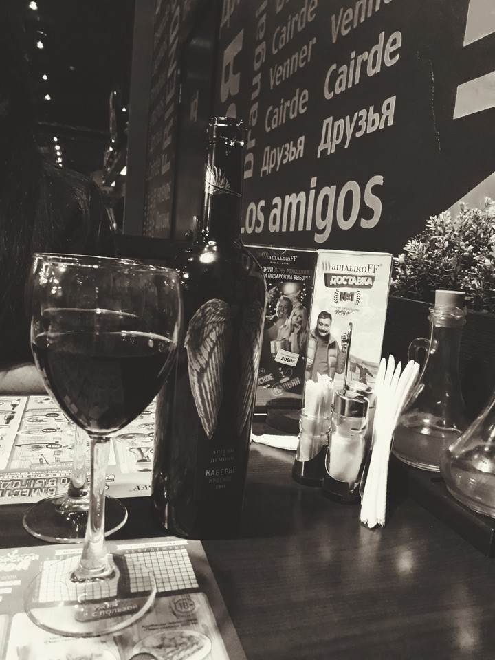An evening with a friend for wine angels and demon