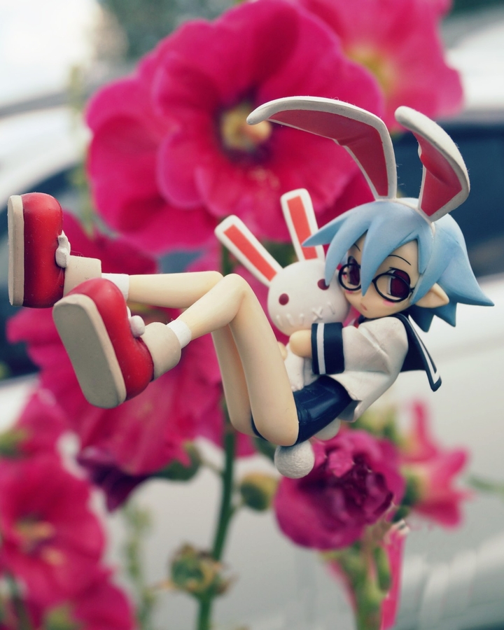 Anime girl behind flowers