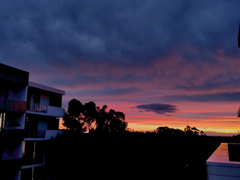 Sunset painting the sky crimson ?