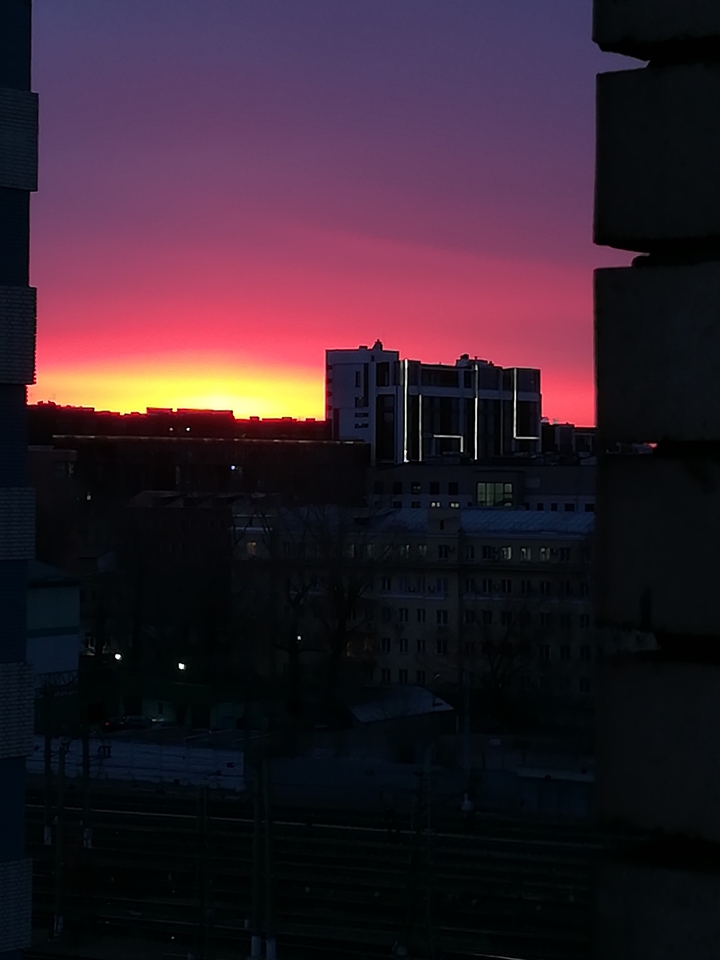 восход солнышко в городе