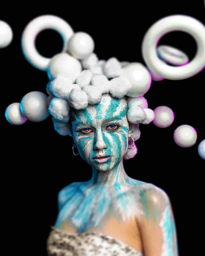 Creative woman portrait body art, neon lights