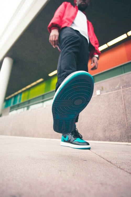 Man standing on concrete ground