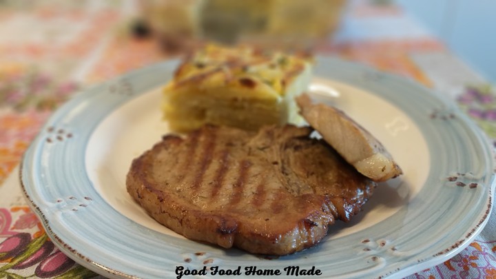 Pork chops with baked potatoes
