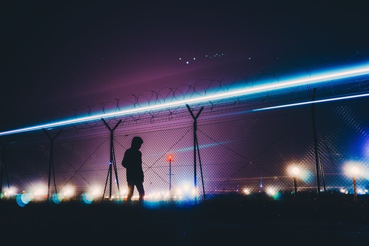 Man Silhouette Barbed Wire