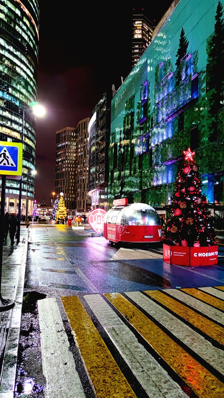 Christmas tree and christmas truck near Empire Tower, M-City