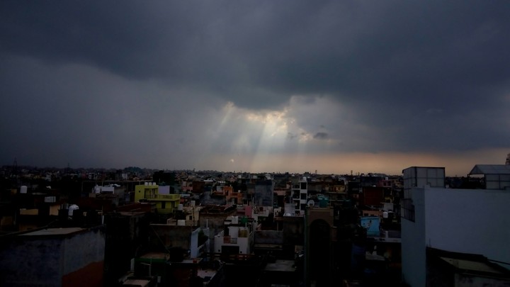 sun behind the clouds