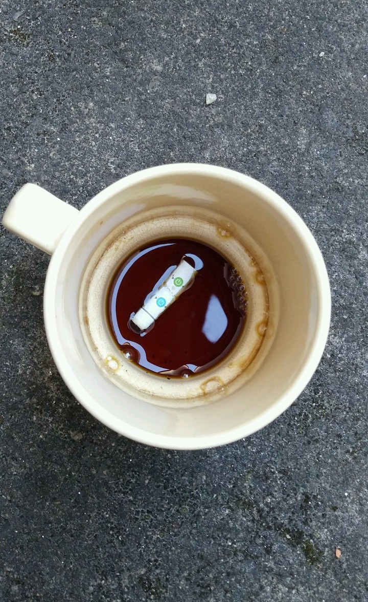 Cigarrete in a mug II