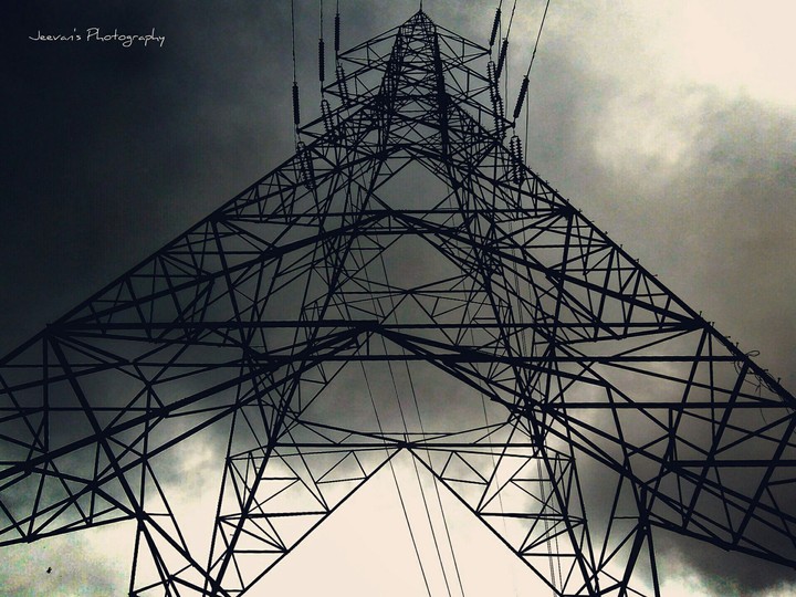 dark clouds and tower