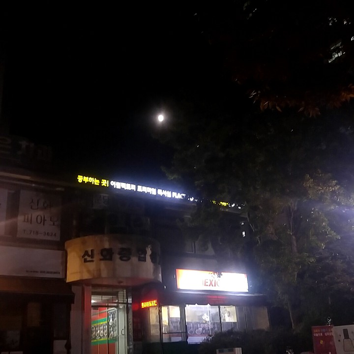 old buildings new moon