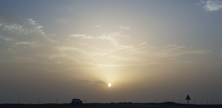 sun set oman dubai road