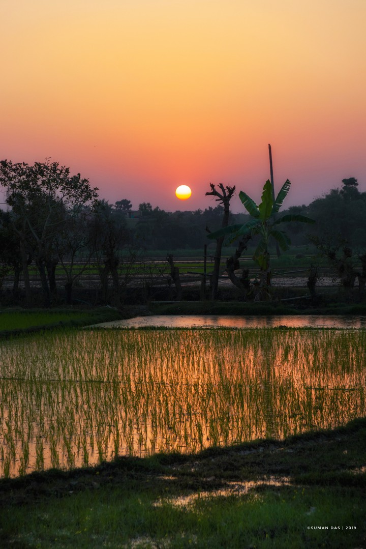 sunset in a village