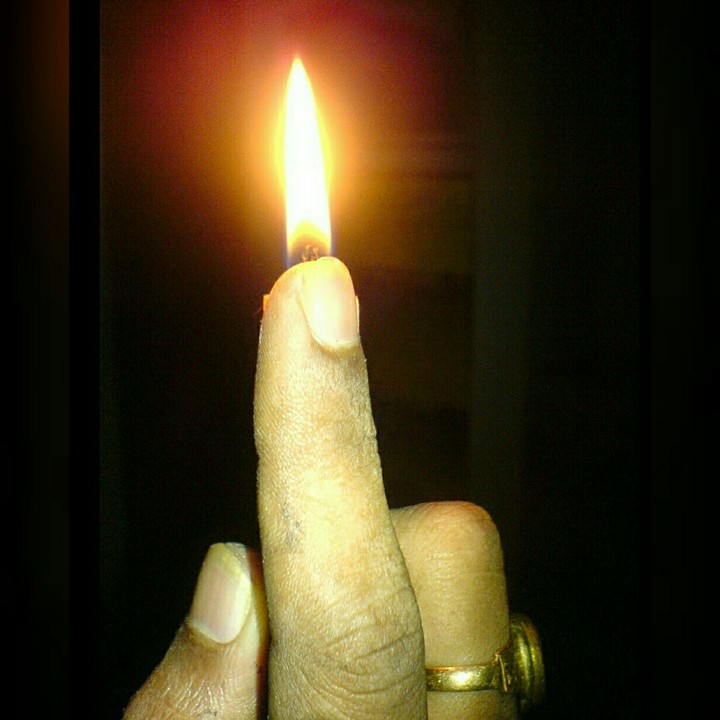 Candle Behind my Fingers....