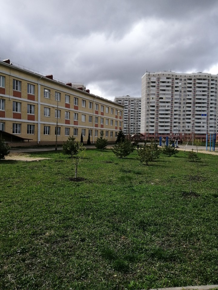 Город