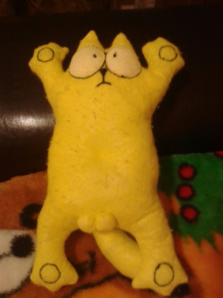 жёлтый кот саймона