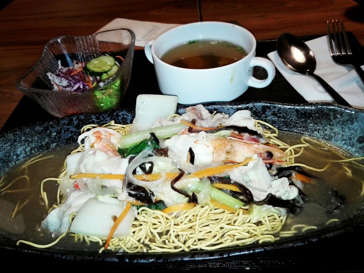 Seafood Soup with salad and noodles