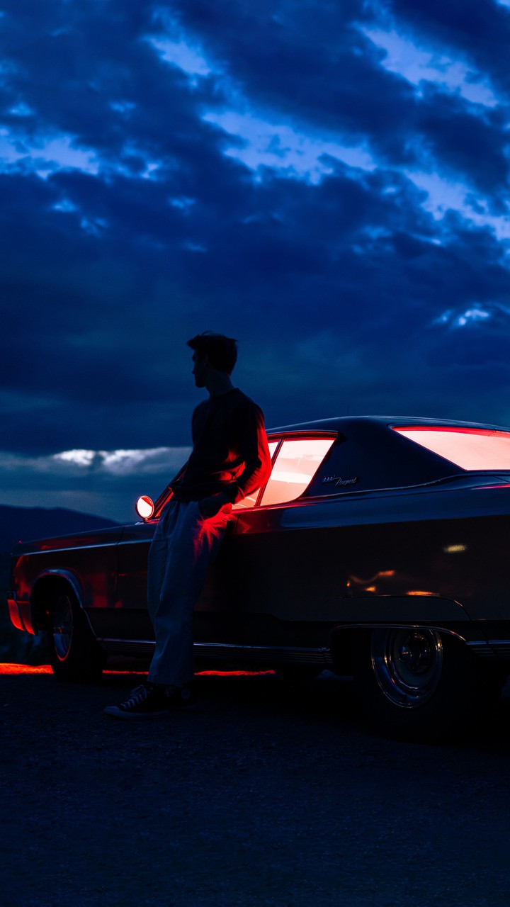 Boy and old school car
