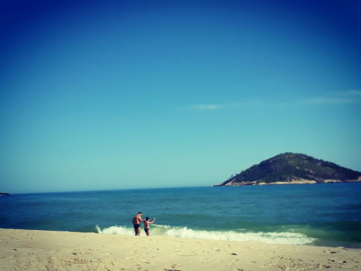I and my son on the Rio, Brazil