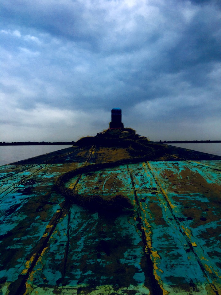 boat having clouds covering