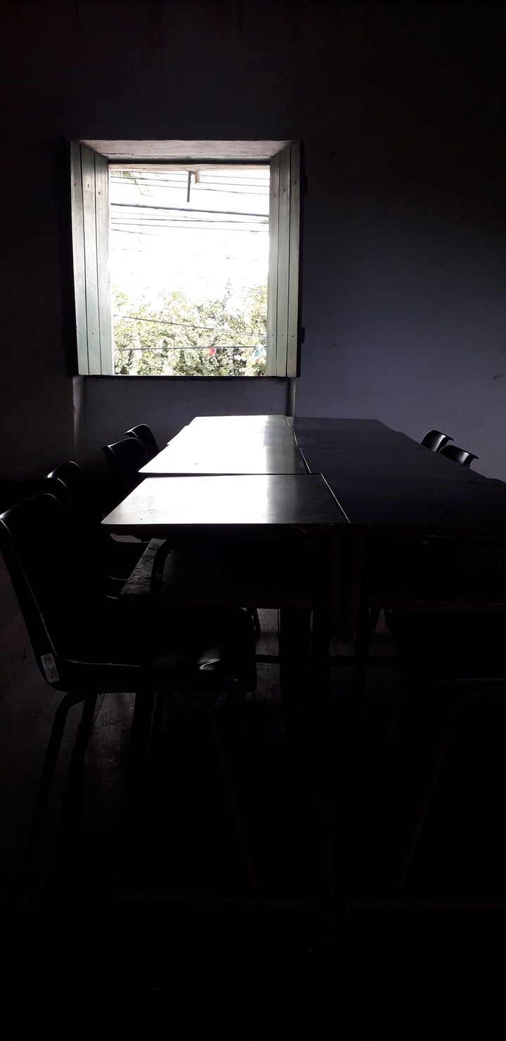 Window and school desks in library teacher Martinz de Aguiar