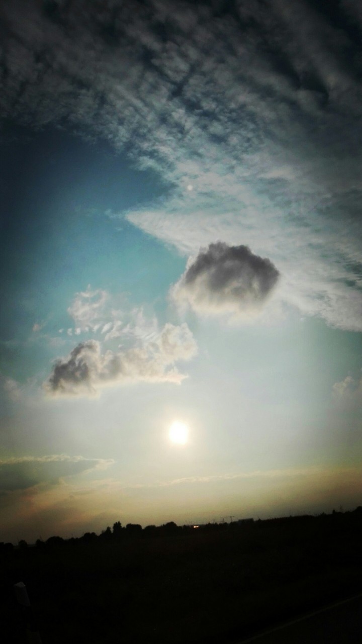 Sonne und Wolken