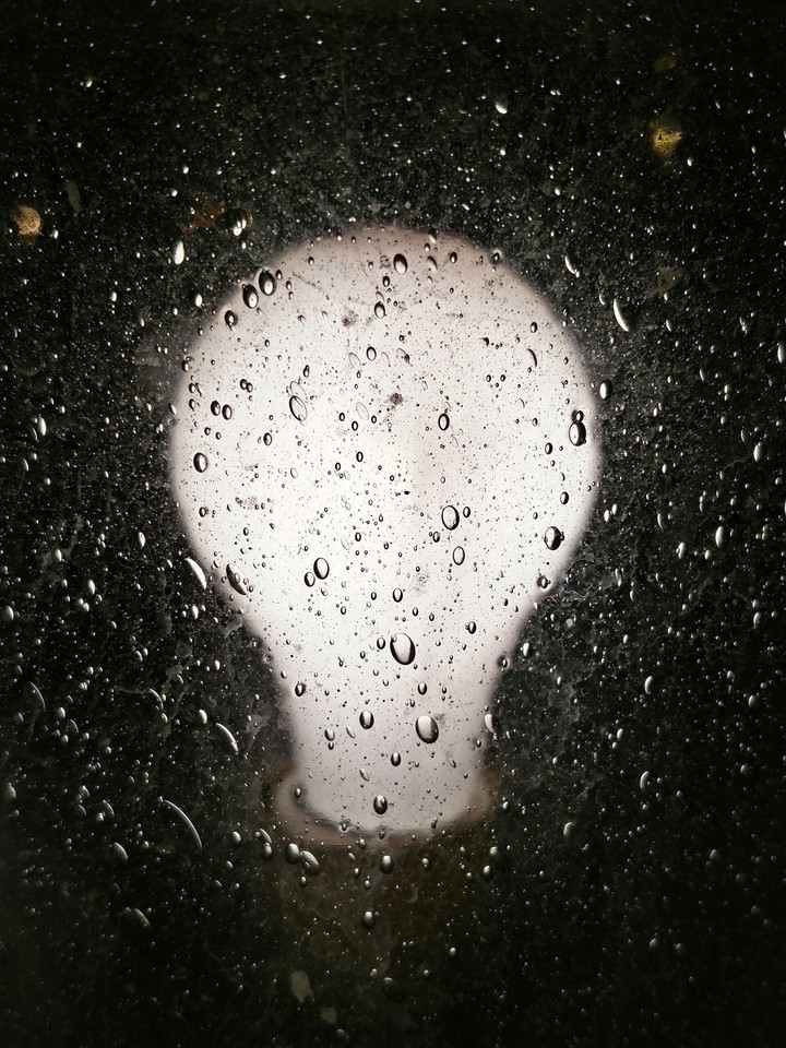 Rain drops on light