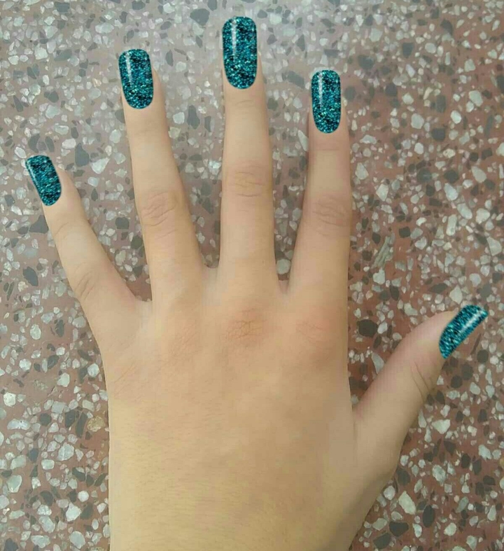 My hands painted with the world's most expensive nail polish