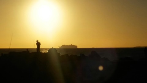 Crucero y pescador