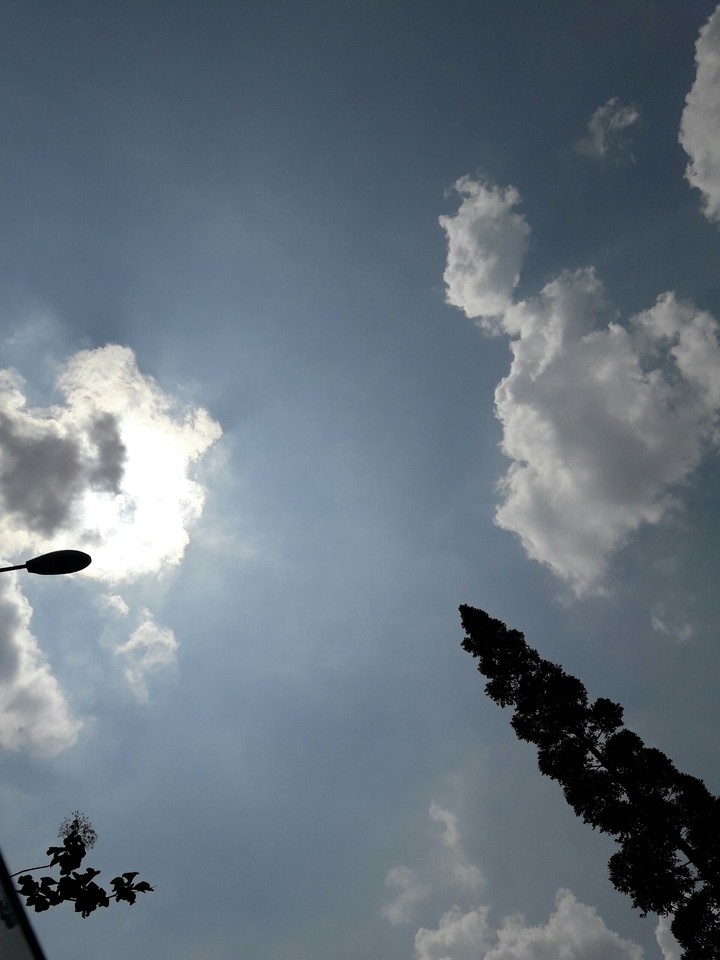 Sunlight behind dark cloud...